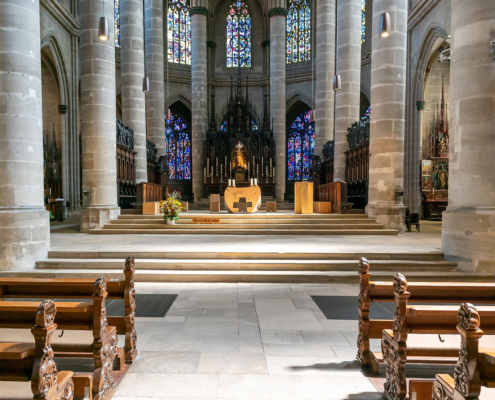 Interior of church, stone floors, sunshine streaming in